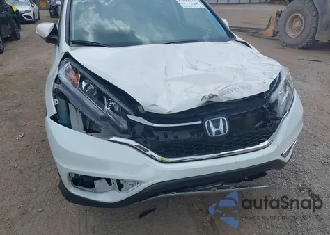 2016 Honda Cr-V Touring z USA, uszkodzony, nr VIN 5J6RM4H95GL118070